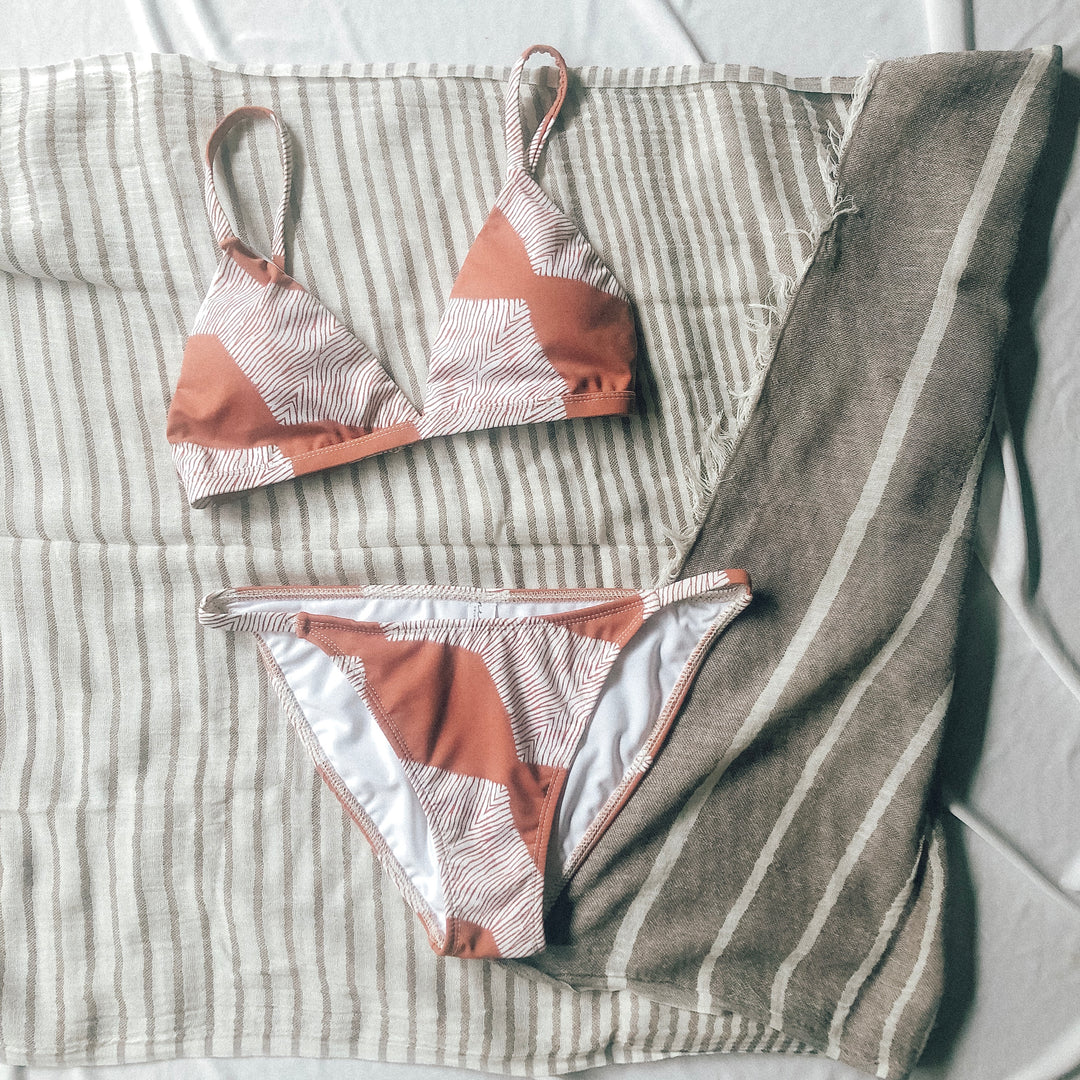 flatlay mona top kora bottom marsala moiré print